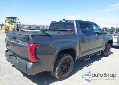 2024 Toyota Tundra Hybrid Trd Pro 4Wd z USA, uszkodzony, nr VIN 5TFPC5DB5RX044076